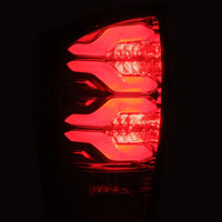 AlphaRex 16-21 Toyota Tacoma PRO-Series LED Tail Lights Red Smoke